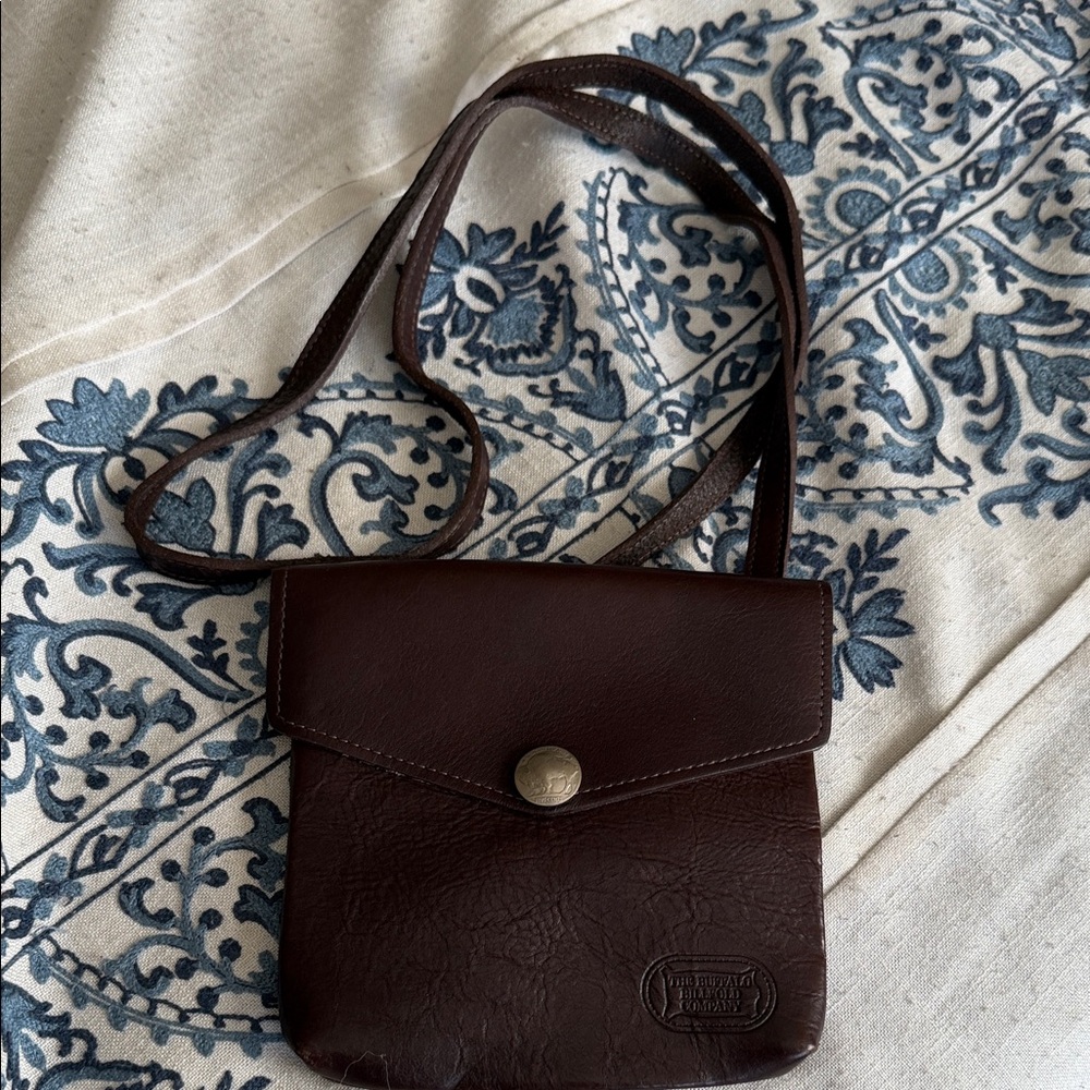 The Buffalo Bill Fold Company Bison Leather Crossbody Bag buffalo coin clasp